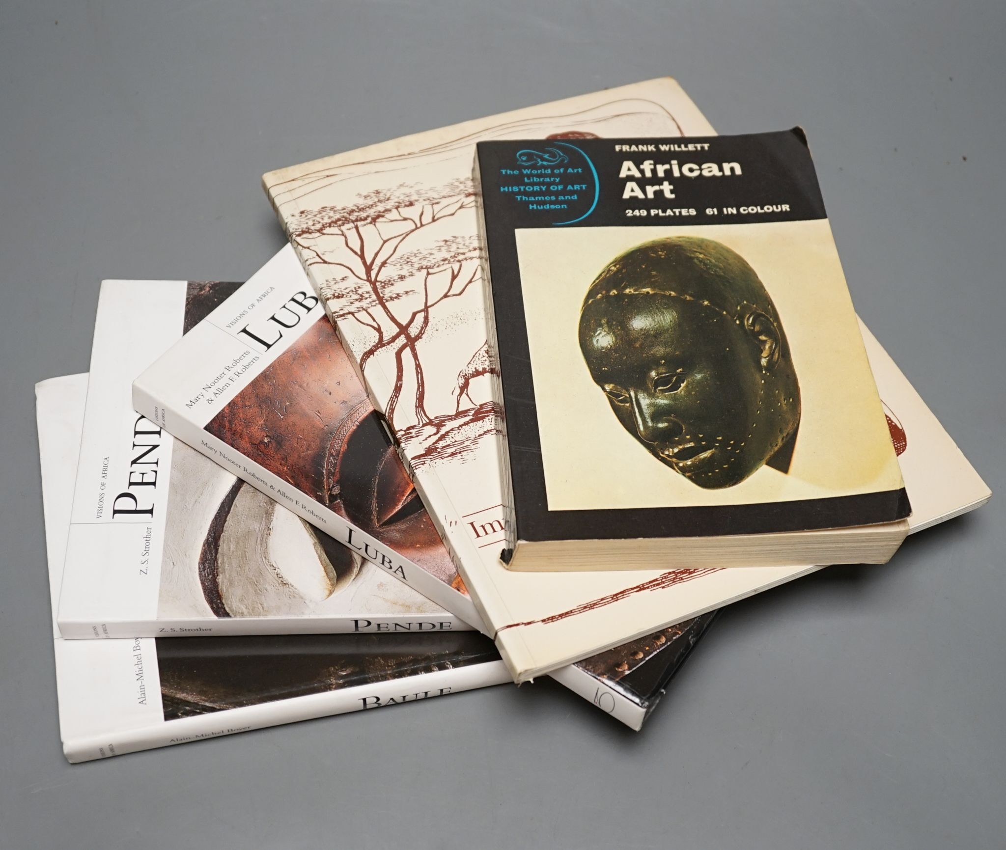 A collection of books relating to ethnographia including Africa Folk Tales and Sculpture with 1958 presentation label to Sir Sydney Phillipson